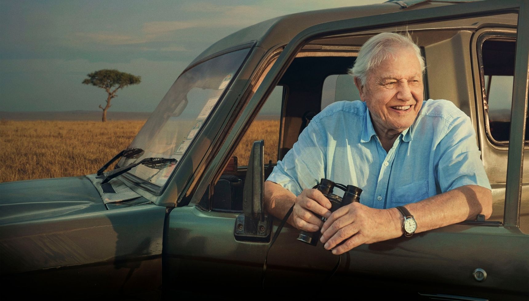 David Attenborough in a car