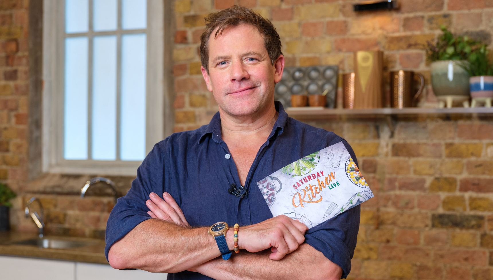 Matt Tebbutt wearing a navy shirt on Saturday Kitchen Live