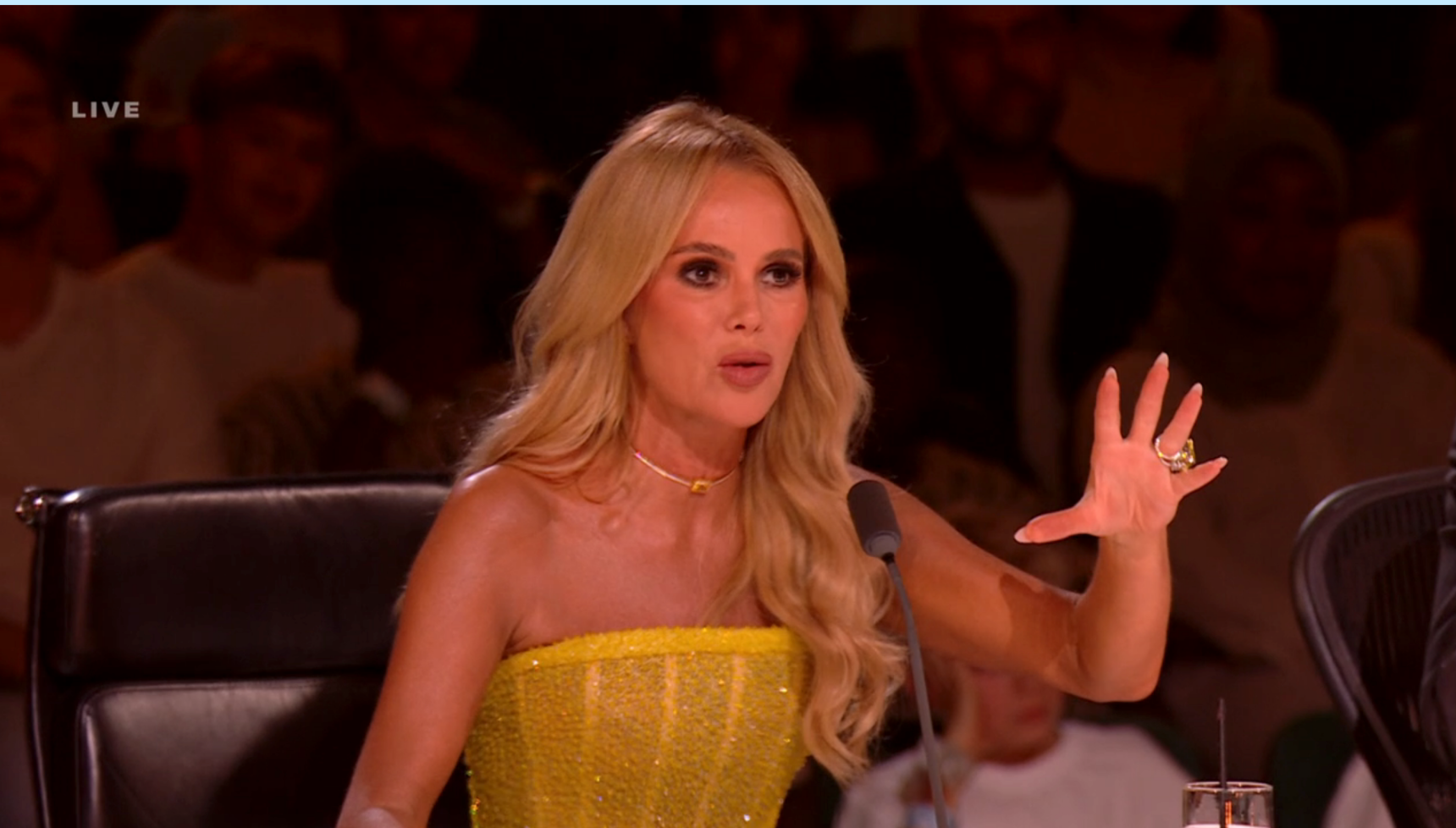 Amanda Holden on BGT wearing a yellow dress