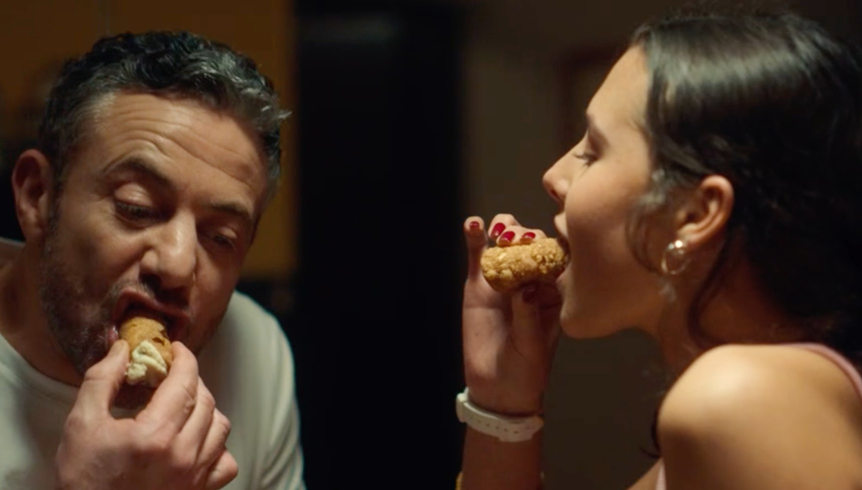 Joe and daughter Angelica eating Capri cannoli in A Taste for Murder 