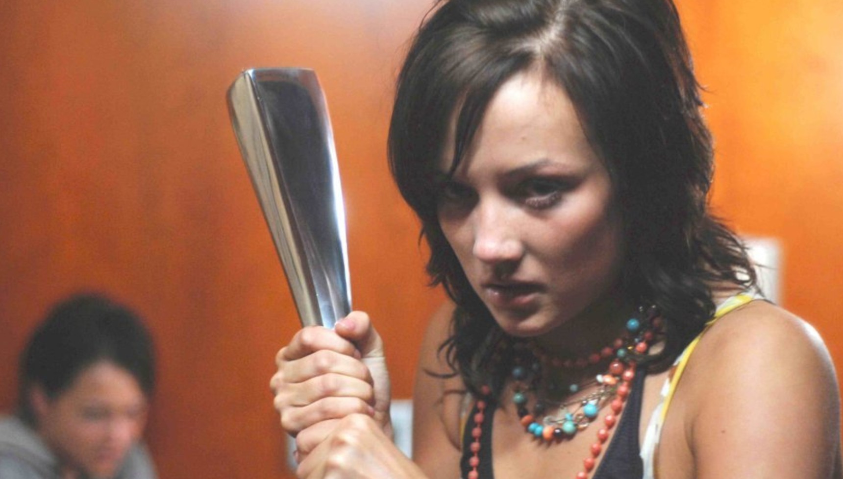 A woman holding a weapon in Donkey Punch
