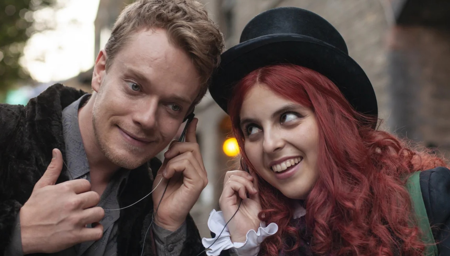 Alfie Allen and Beanie Feldstein in How to Build a Girl