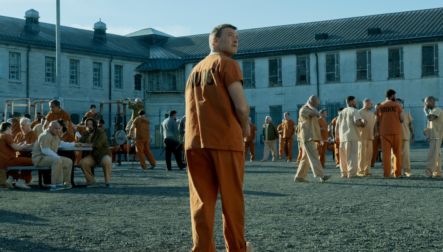 Sam Worthington in a prison outfit in I Will Find You