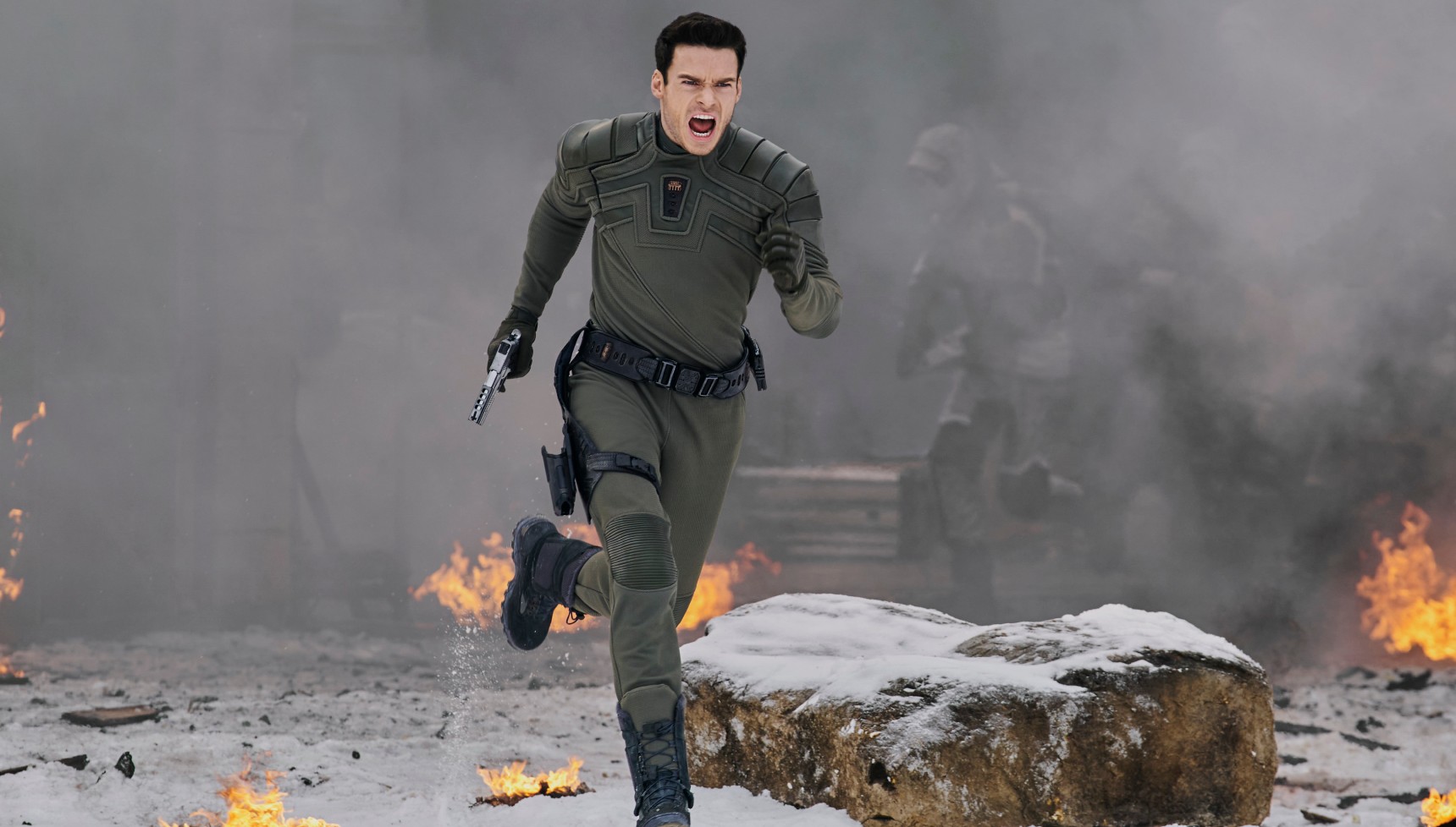 Richard Madden running with a gun in Citadel