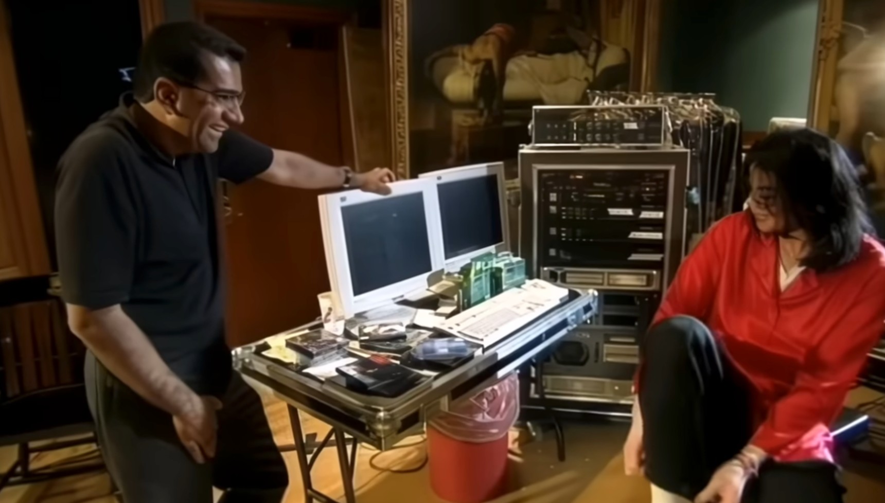 Martin Bashir laughing with Michael Jackson