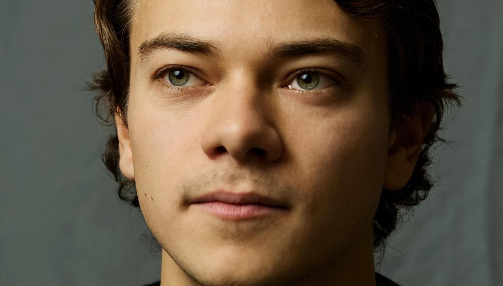 Conrad Khan headshot