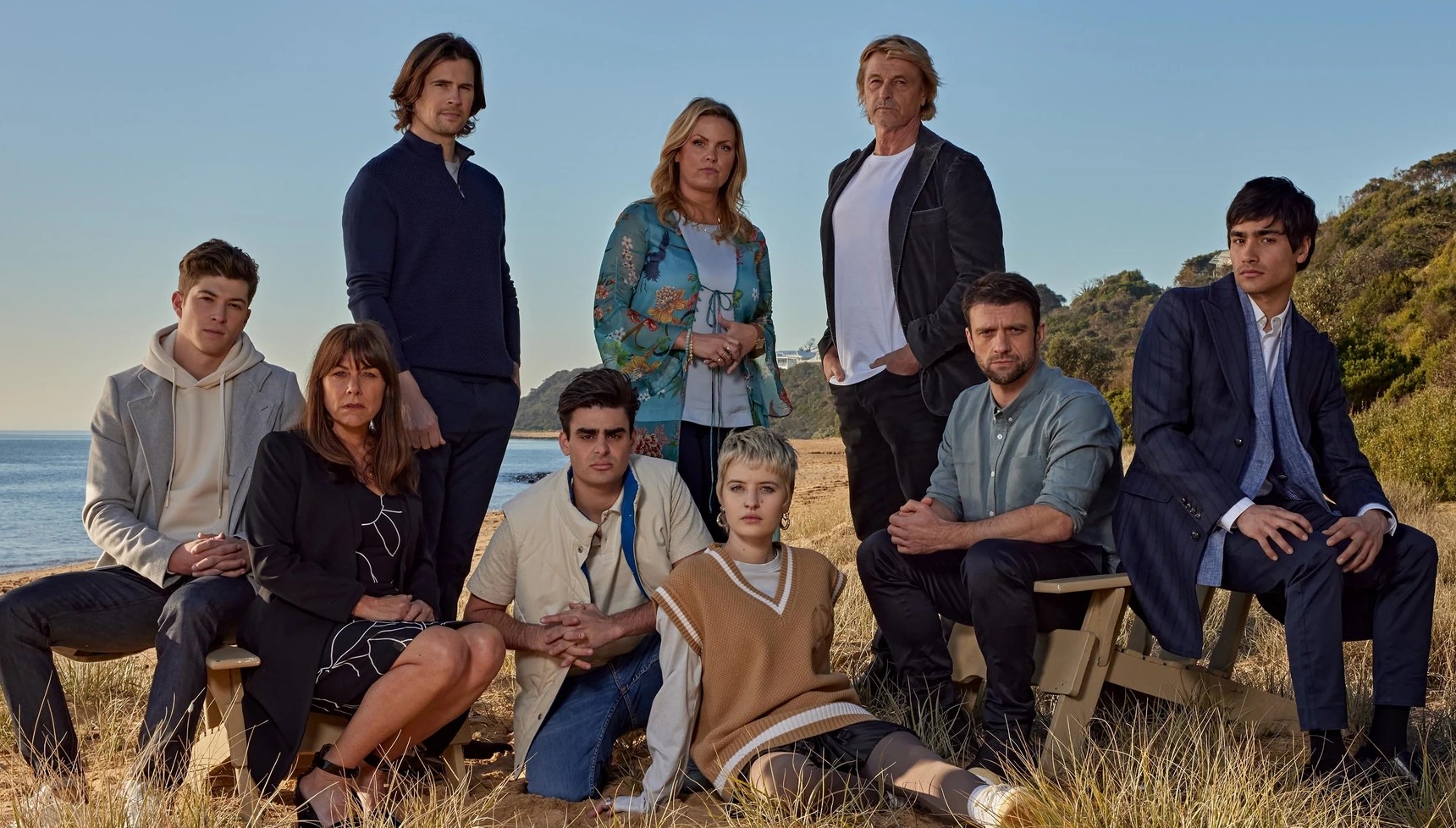 The cast of Riptide on a beach in Australia