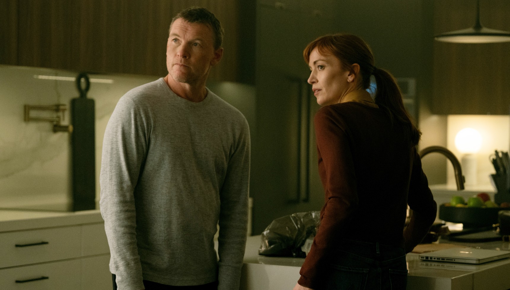 Sam Worthington and Britt Lower as David and Rachel in I Will Find You on Netflix