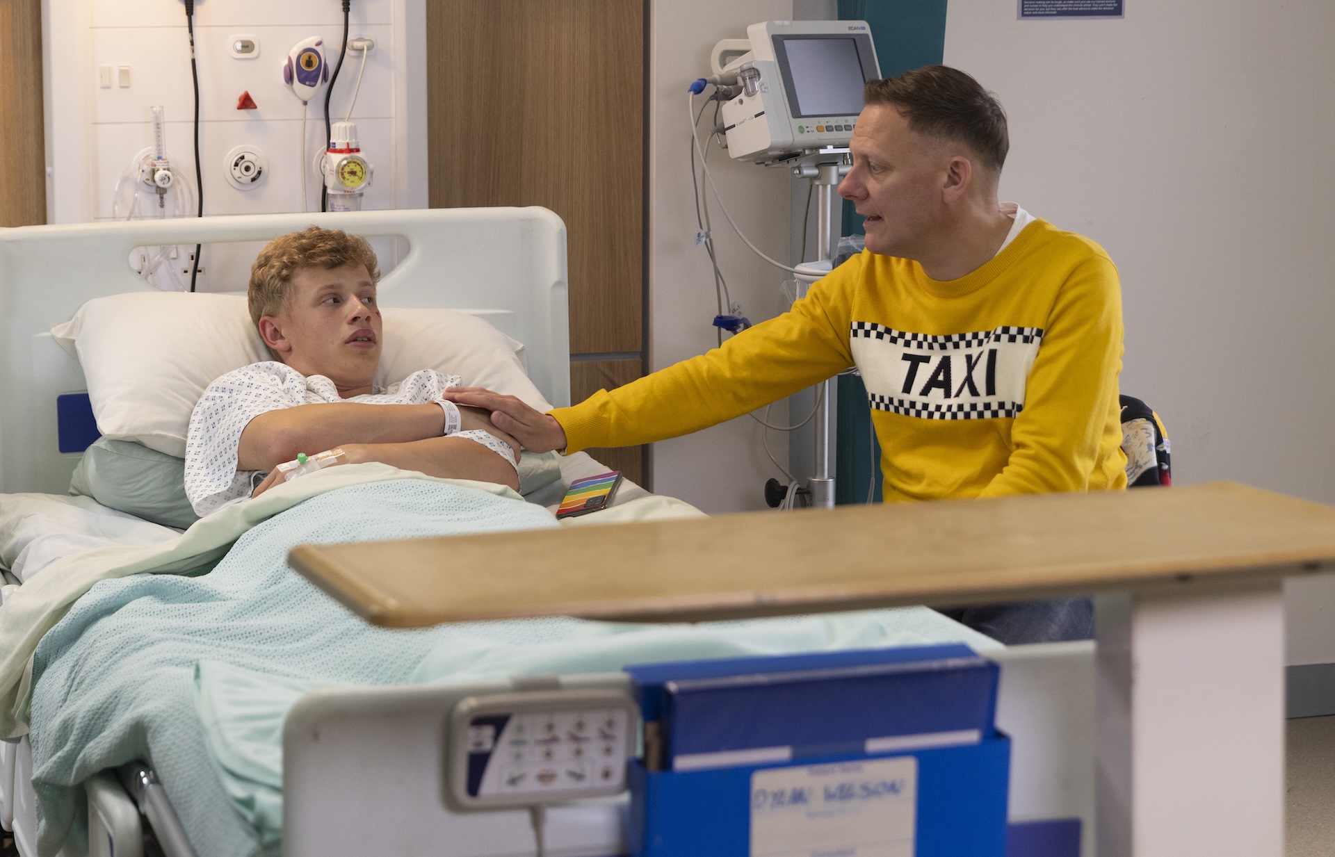 Sean tending to Dylan in hospital in Coronation Street