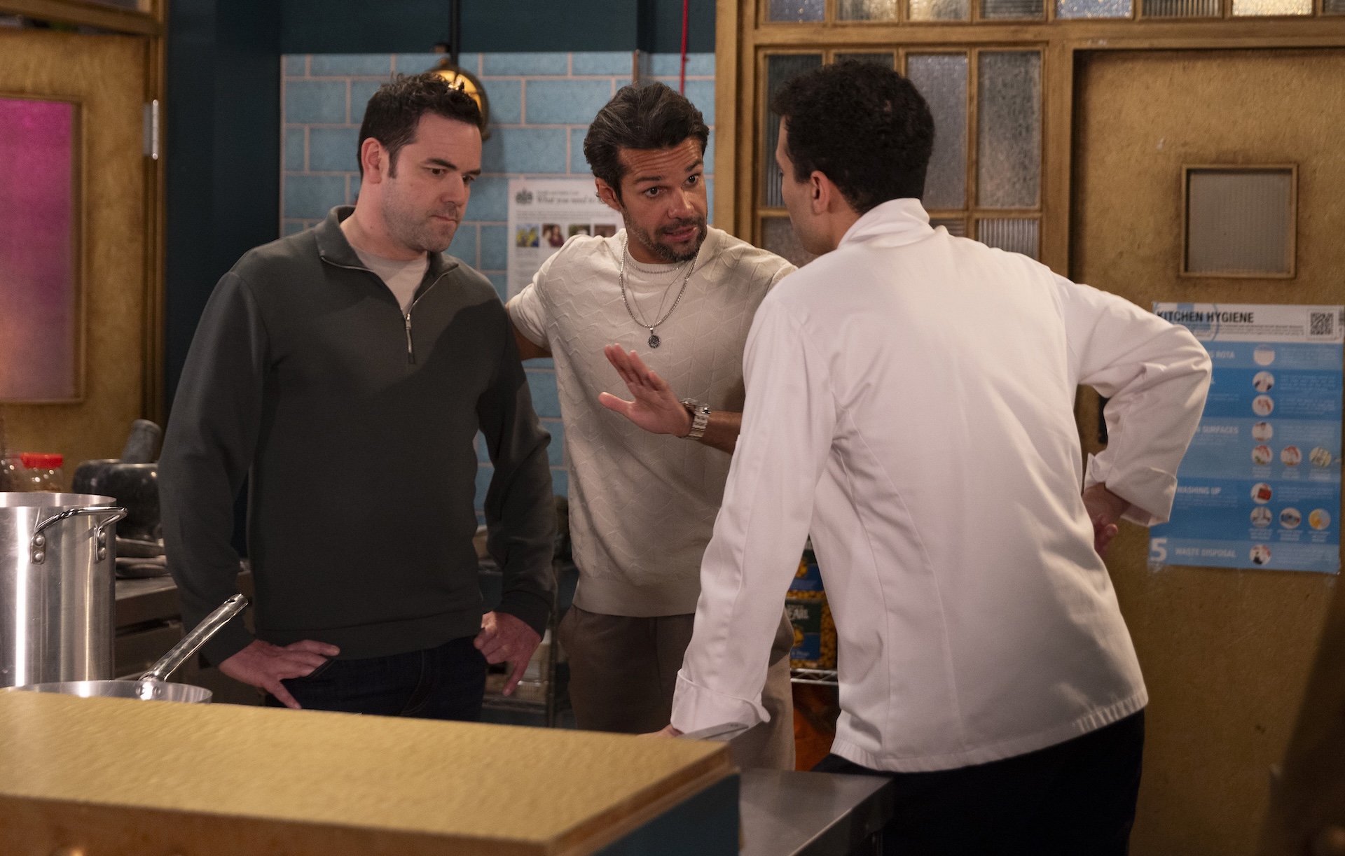 Be, Idris and Ollie arguing at Speed Daal in Coronation Street