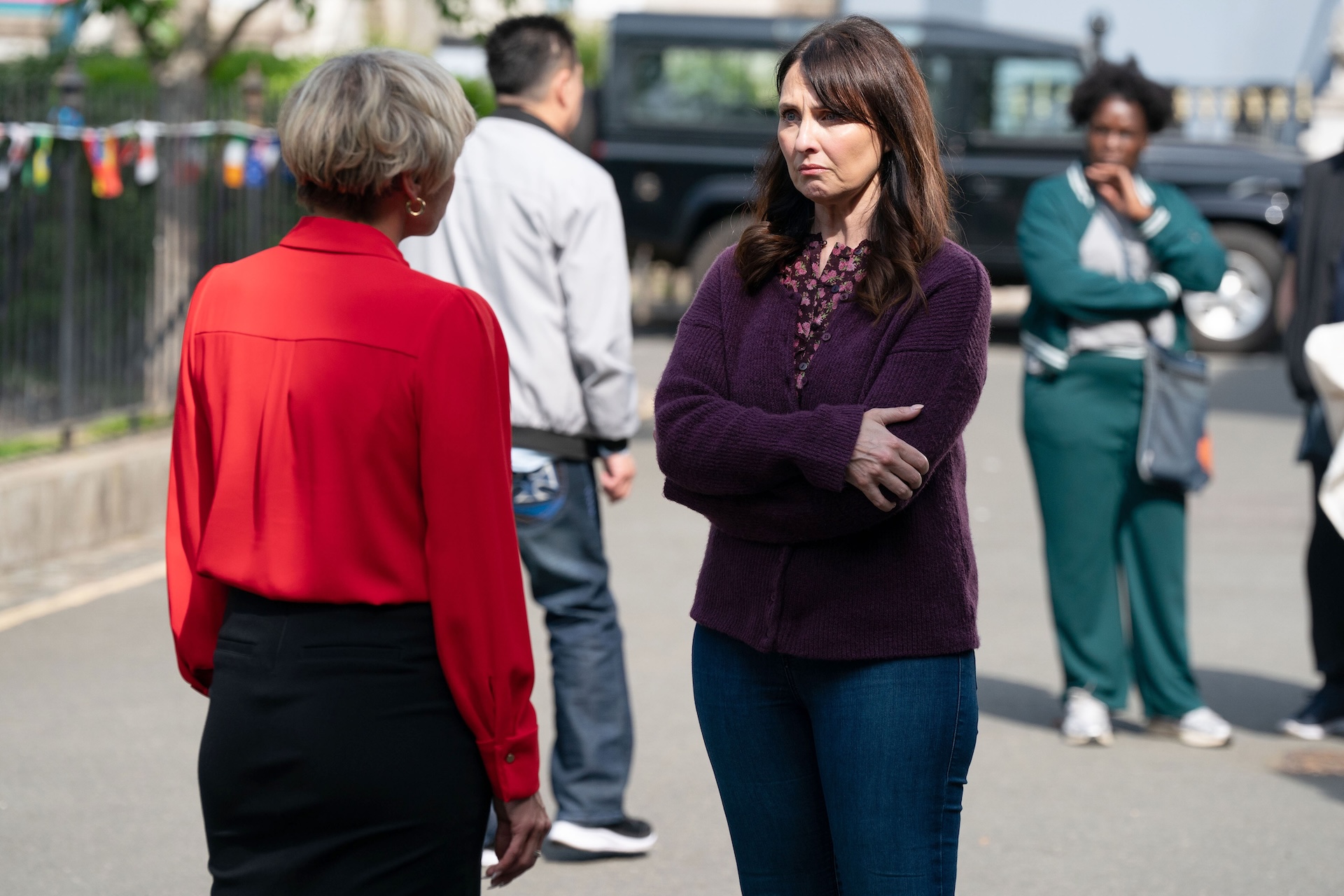 Nicola and Honey concerned outside in EastEnders