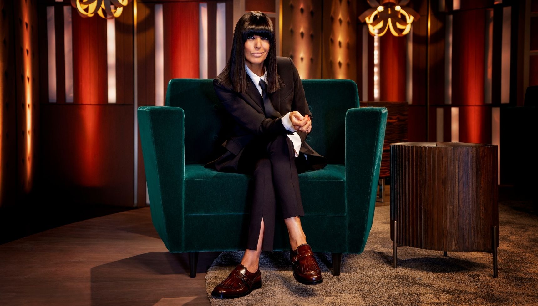Claudia in black suit 