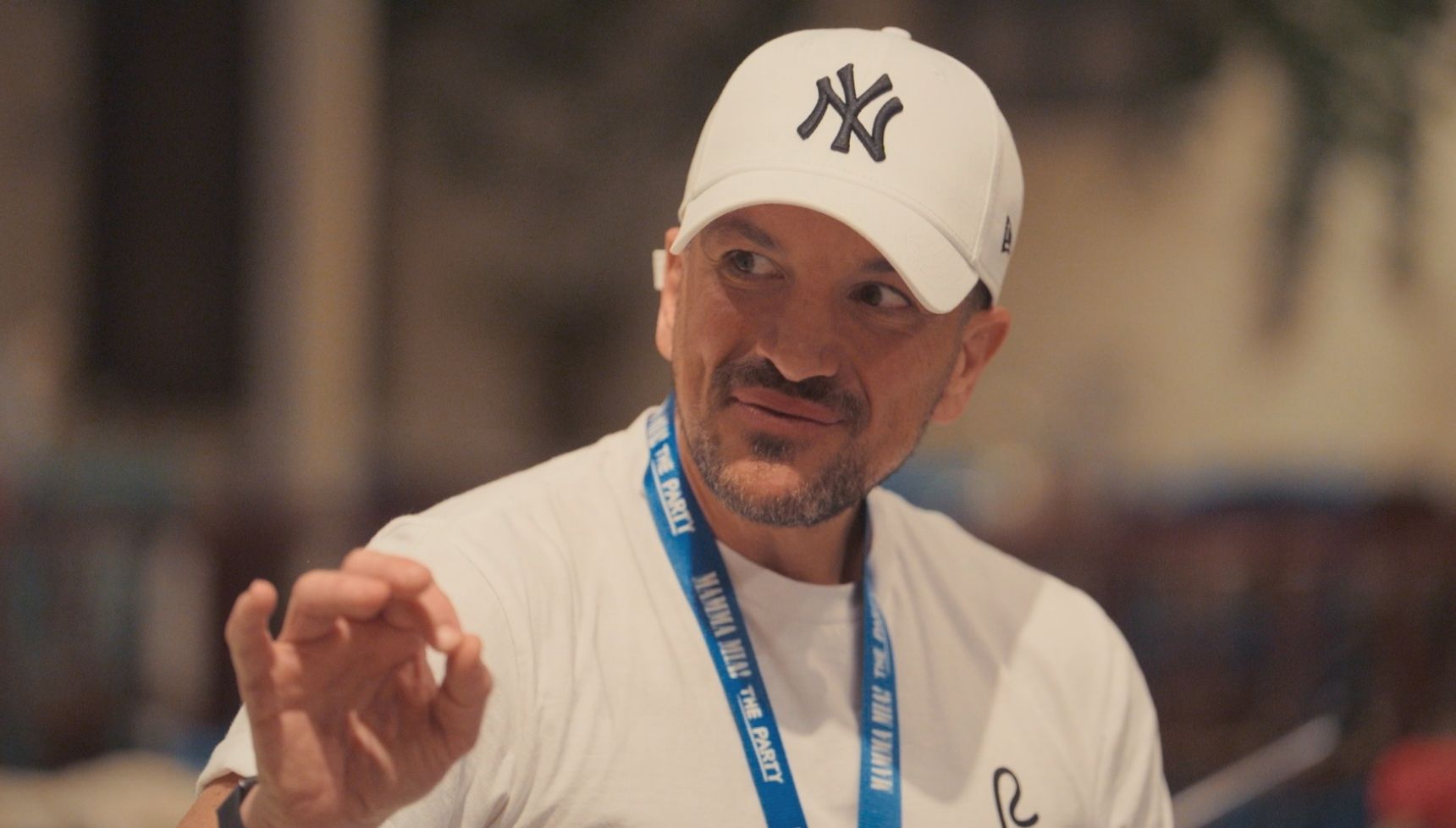 Peter Andre in white baseball cap