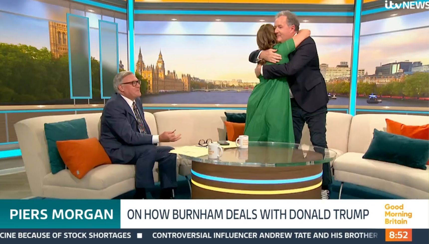 Piers Morgan and Susanna Reid hug on his GMB return