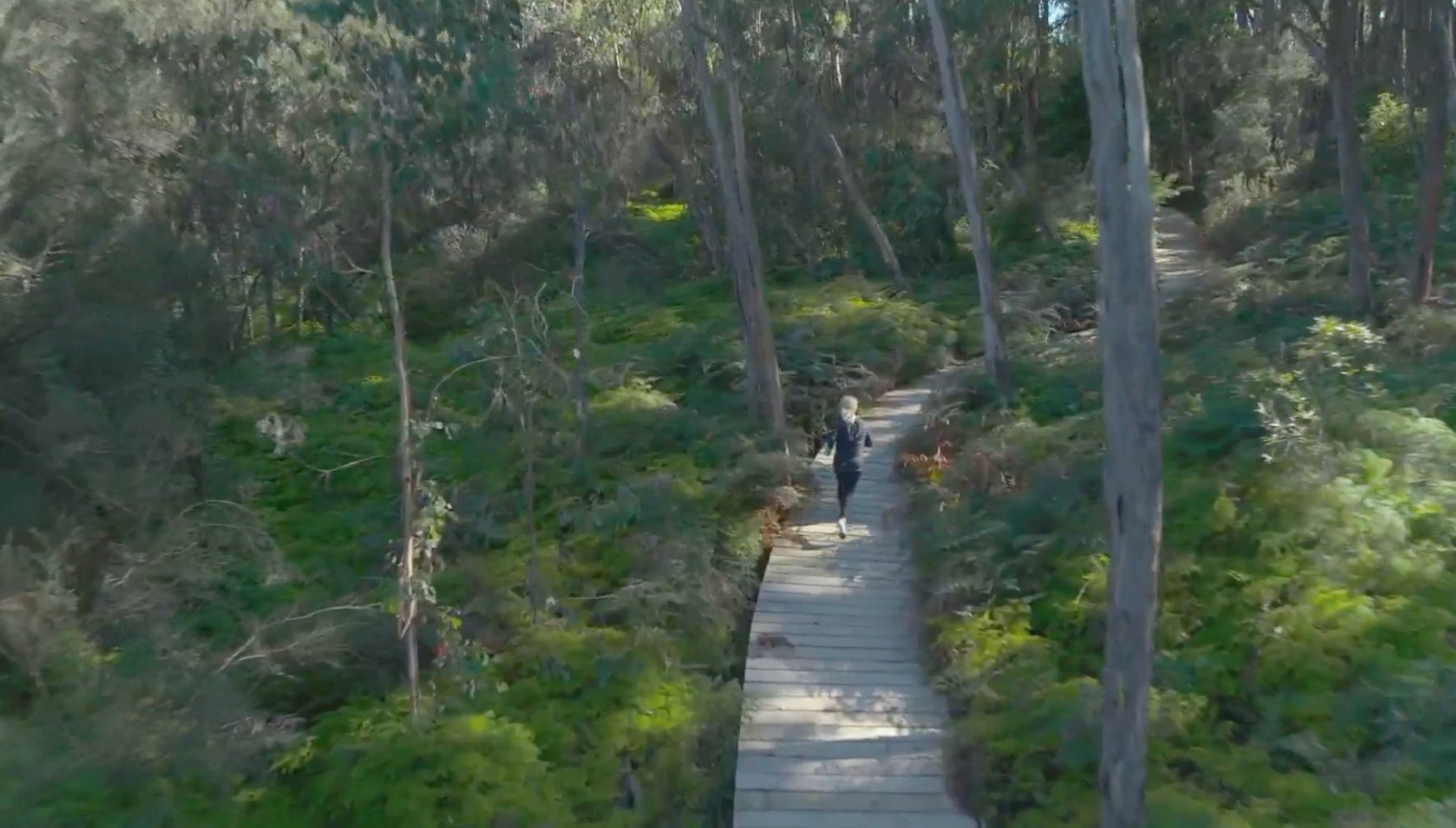 Charlie Brooks' Anna going for a run through woodland in Lie with Me