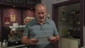 Jimmy opens a worrying letter in Emmerdale