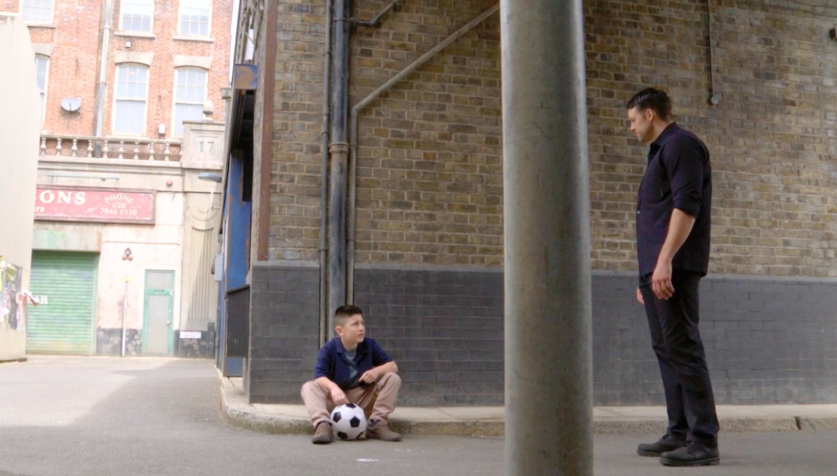 Louie and Mark talk in EastEnders