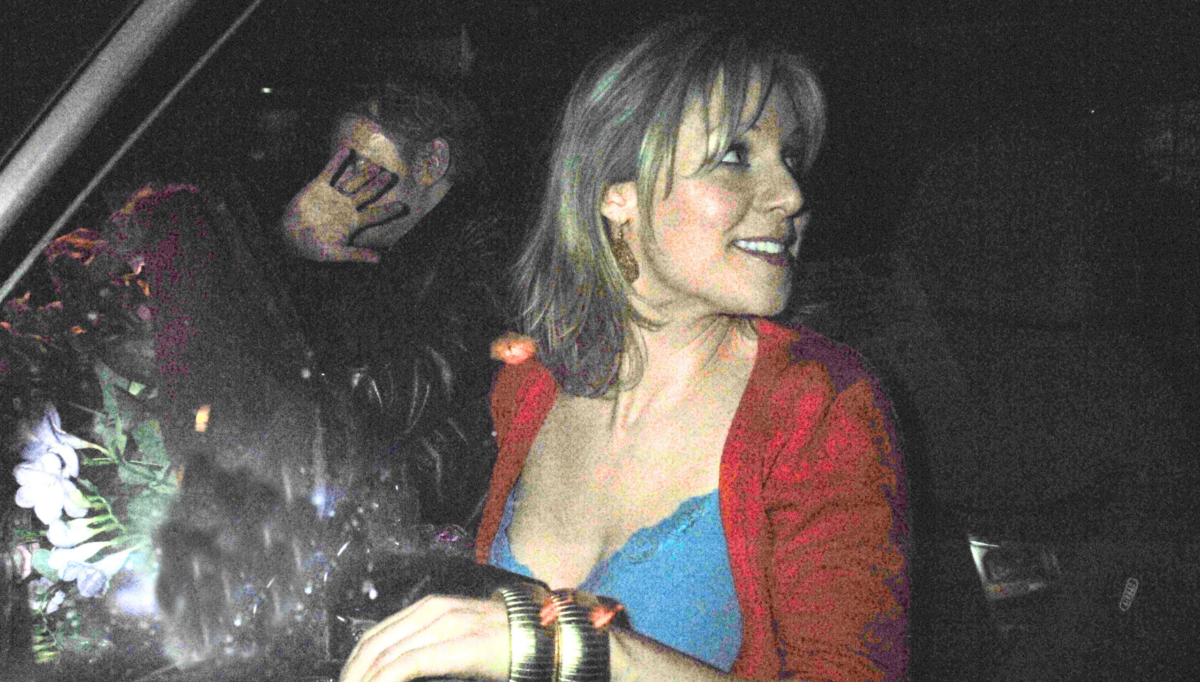Marc warren and Abi Titmuss in the back of a car