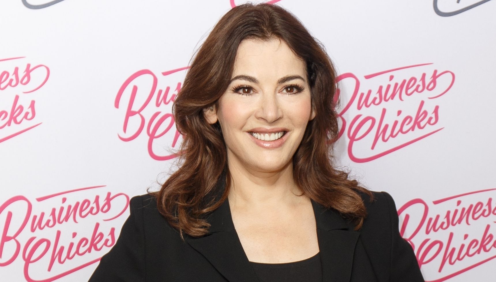 Nigella Lawson wears a black suit jacket