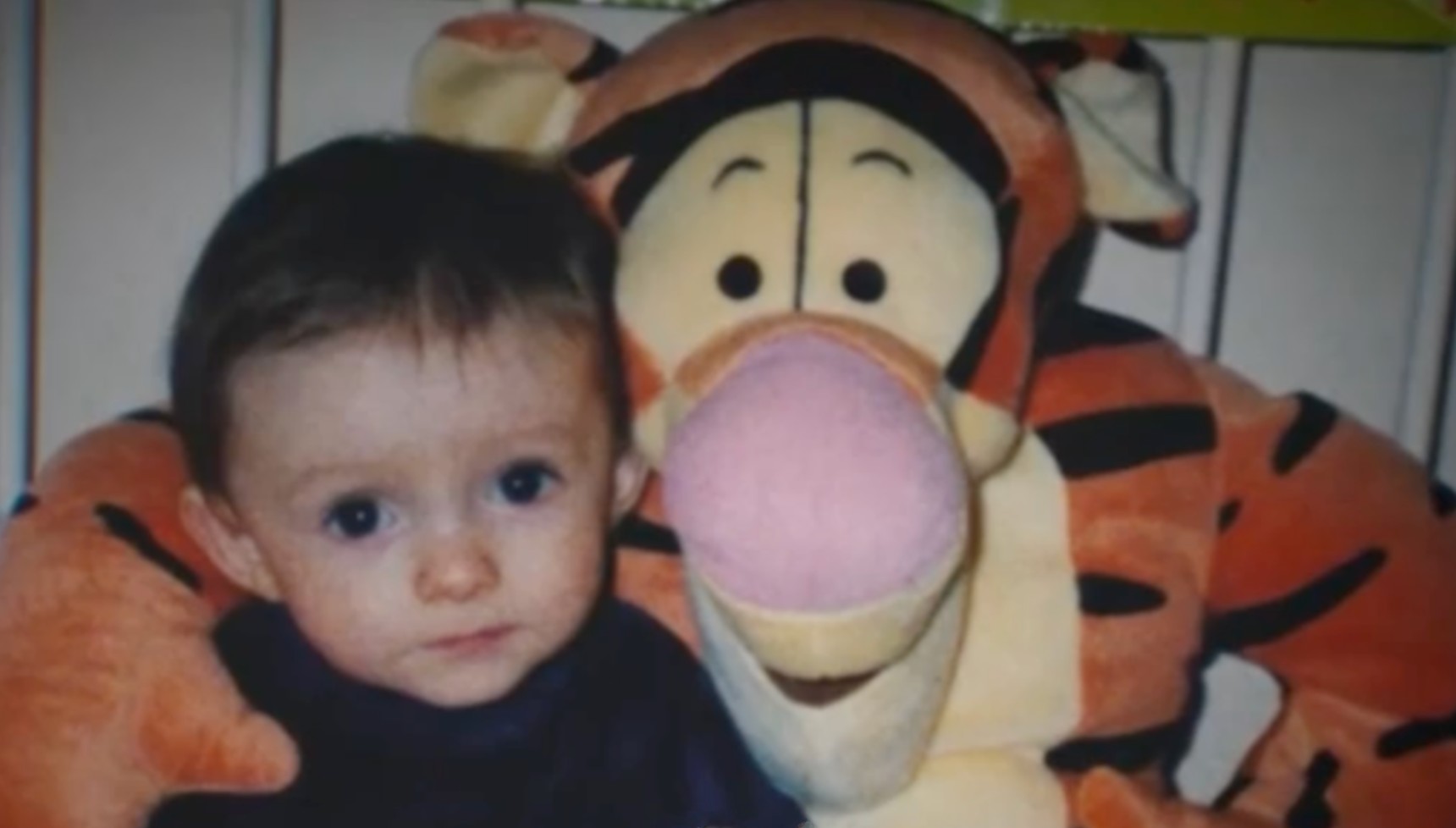 Young Matthew seen with Tigger