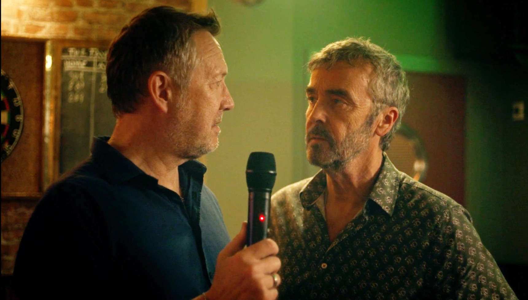 Eddie and Dennis singing karoake in The Tavern in Benidorm is Murder