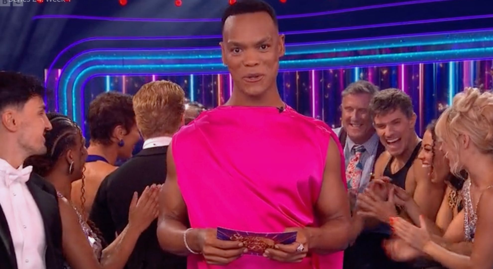 Johannes Radebe in a pink dress on Strictly