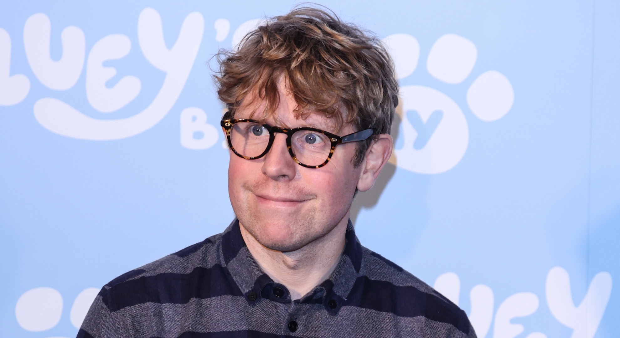 Josh Widdicombe smiling at event