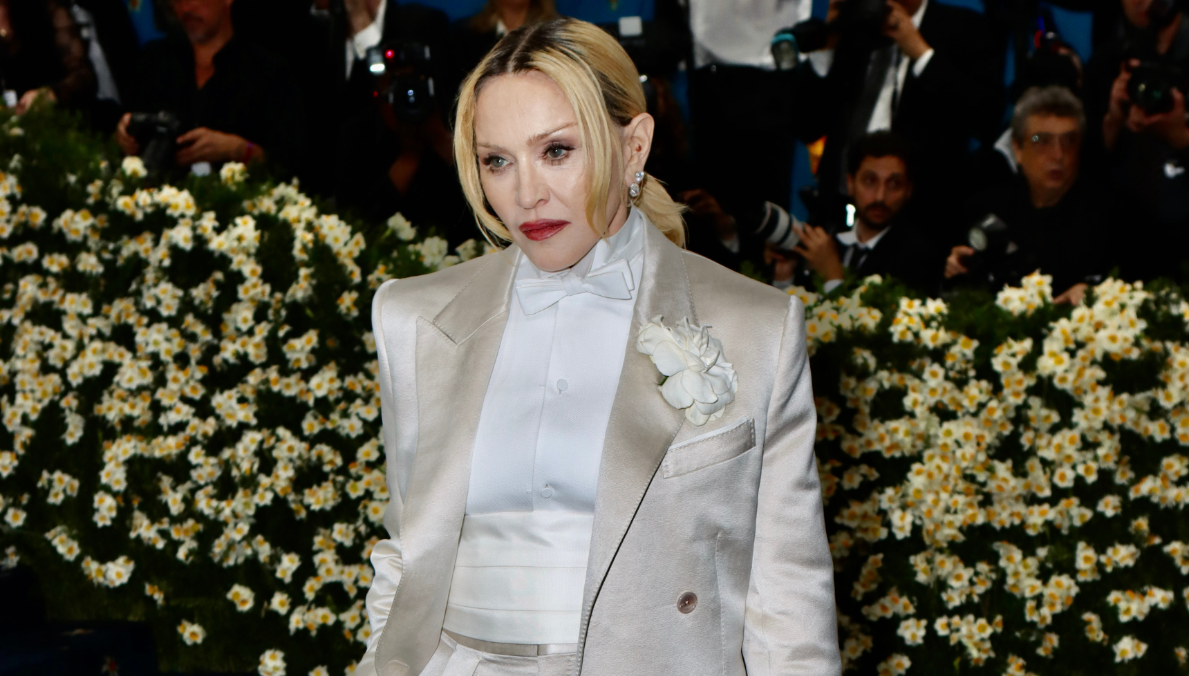 Madonna in cream satin suit