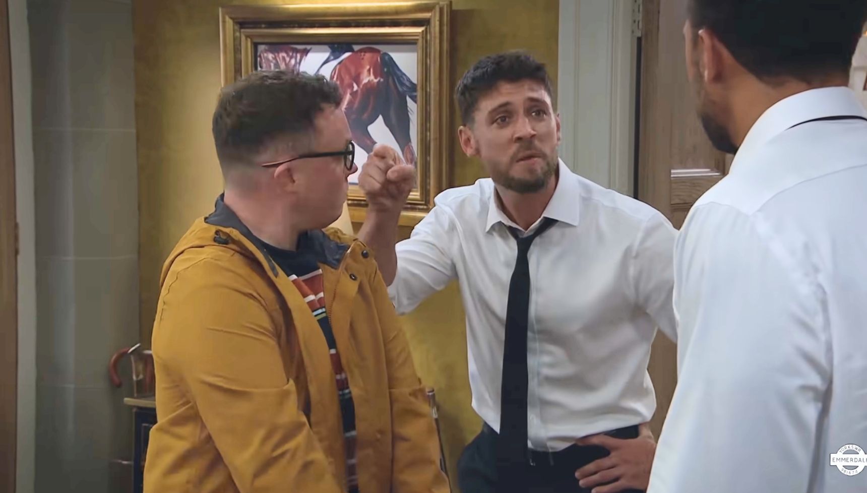 Joe and Billy attacking Vinny in Emmerdale