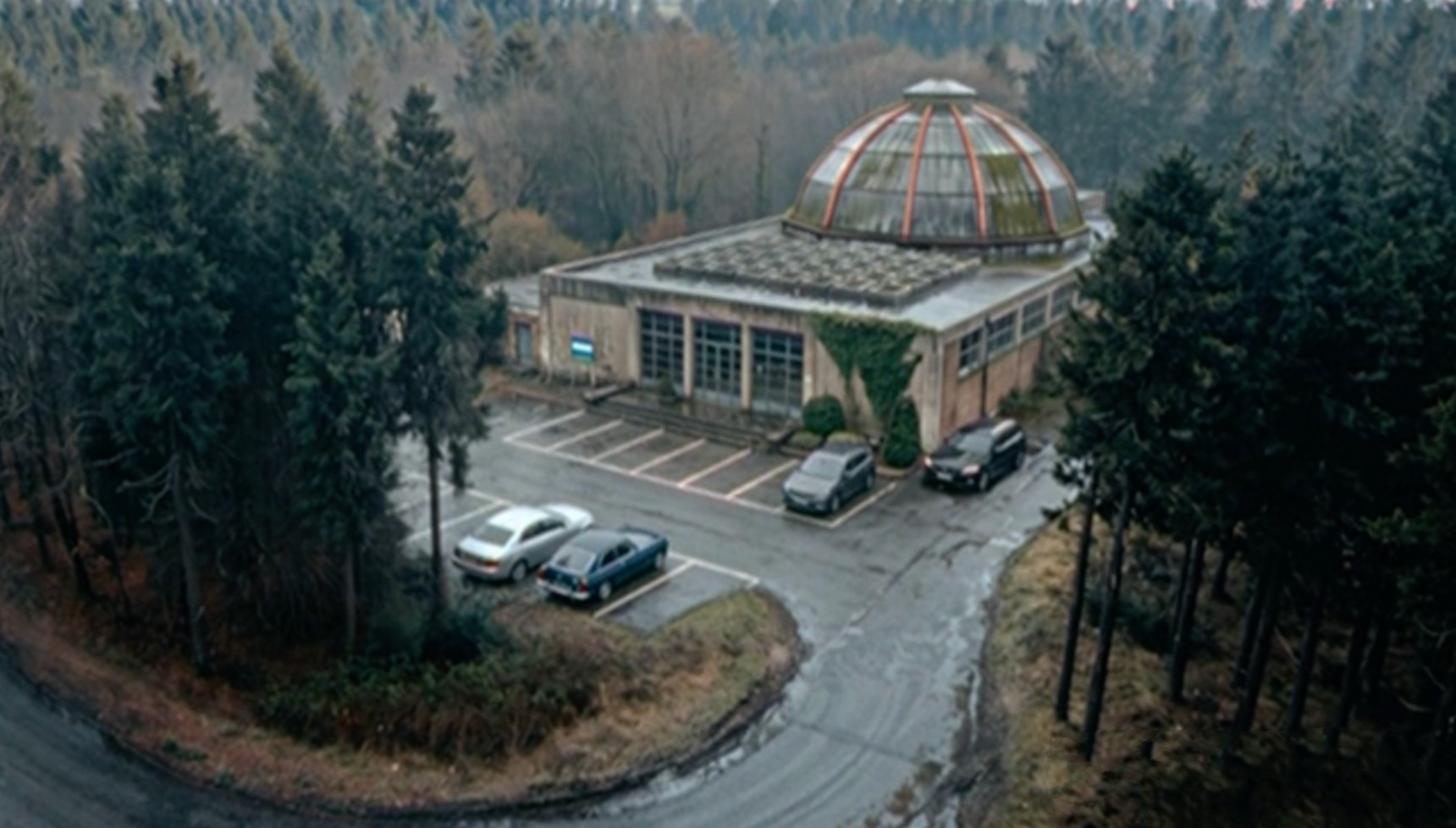 Dr Ethan Winter's distinctive laboratory with a glass dome set amidst a dense forest