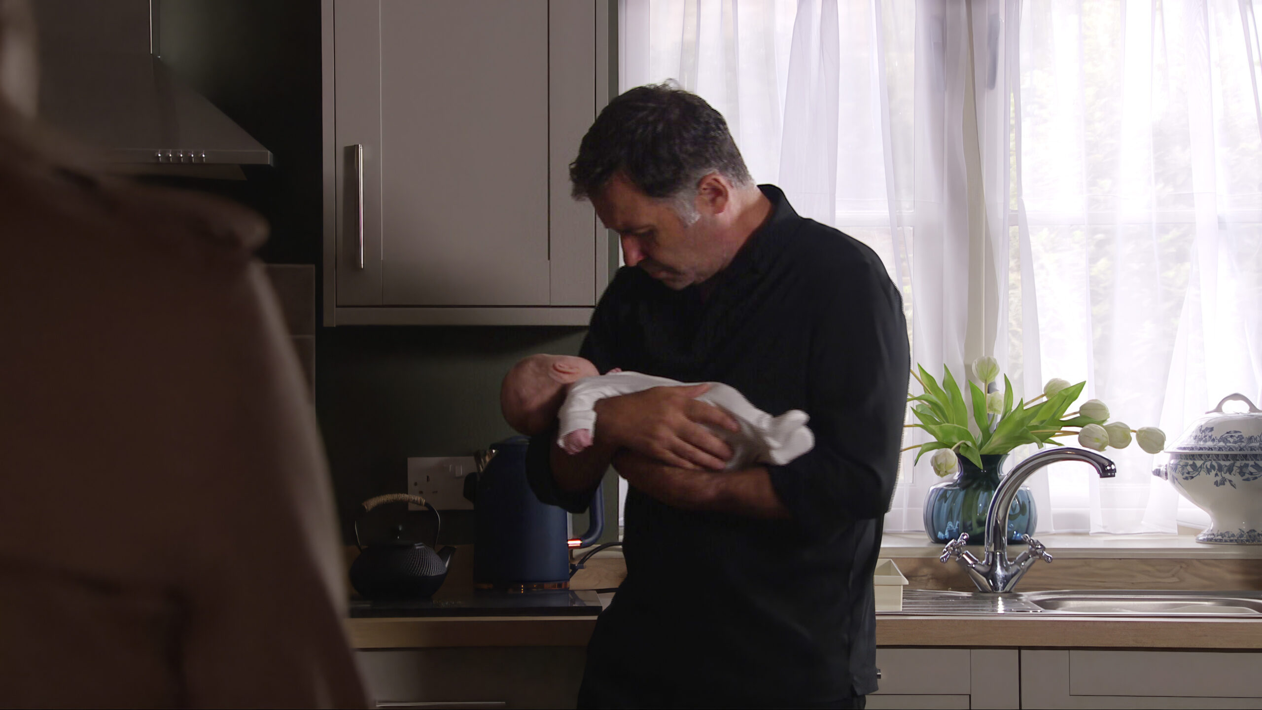 Graham holding Baby Tate in Emmerdale (Credit: ITV)