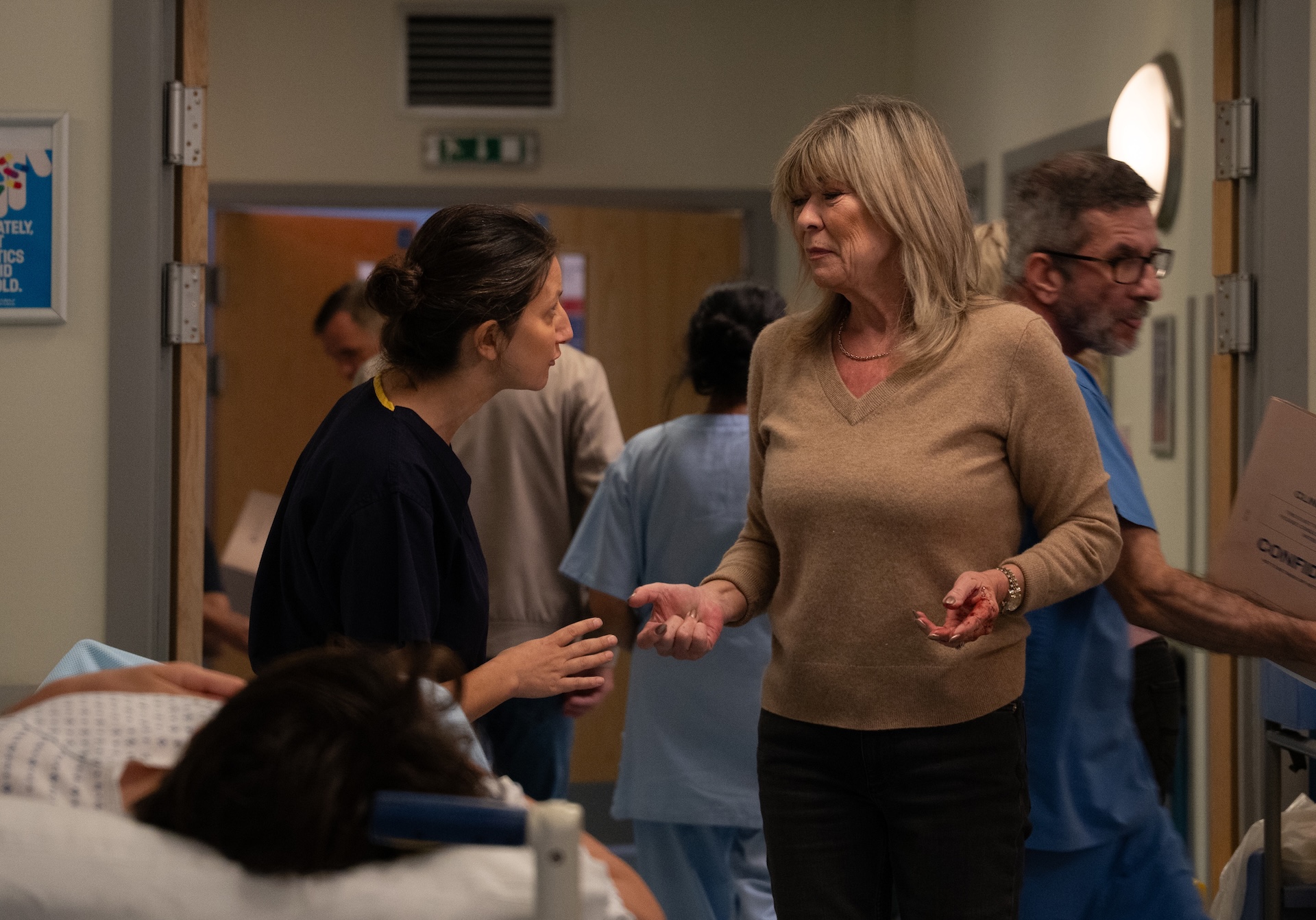 The doctor wants to call the police, but will Kim be arrested? (Credit: ITV)