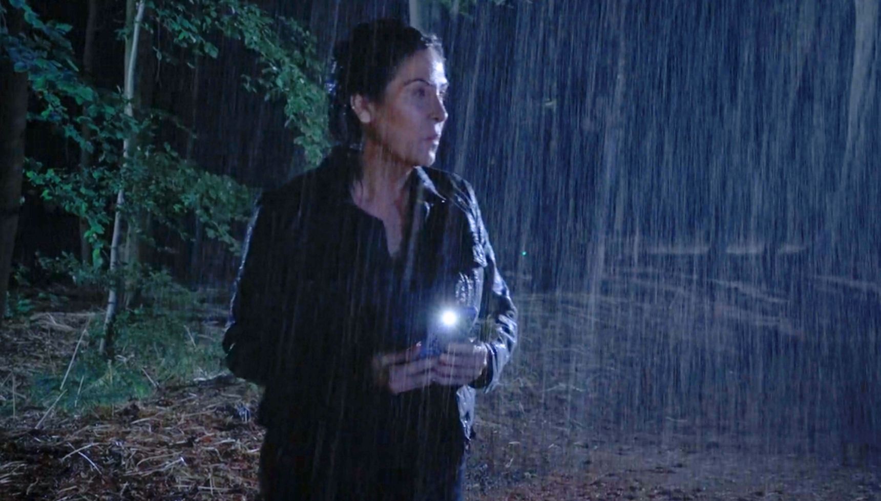 Kat in the woods in EastEnders (Credit: BBC)