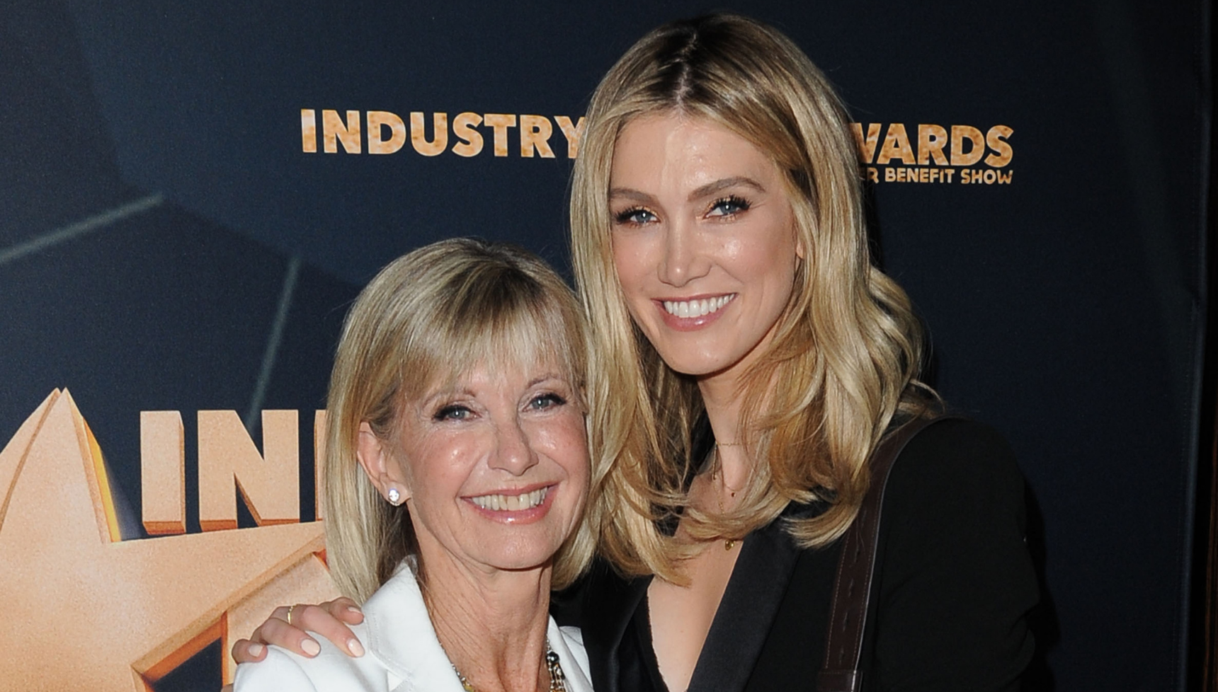 Delta Goodrem and Olivia Newton-John pose together in 2019