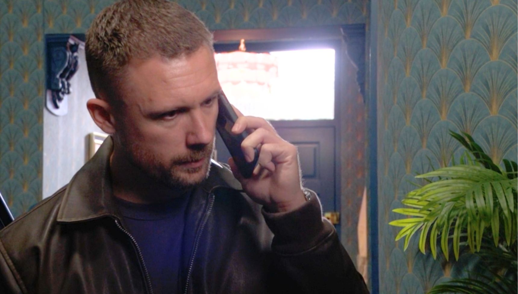 Lee on the phone in EastEnders