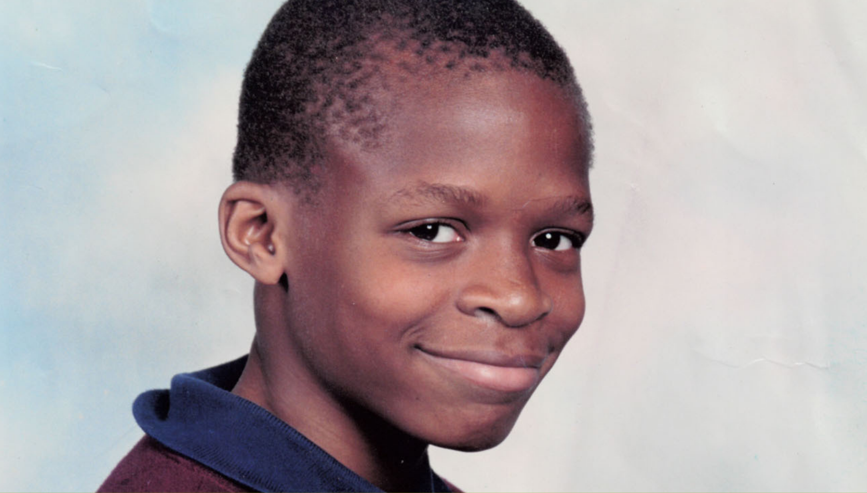 Damilola Taylor in school uniform