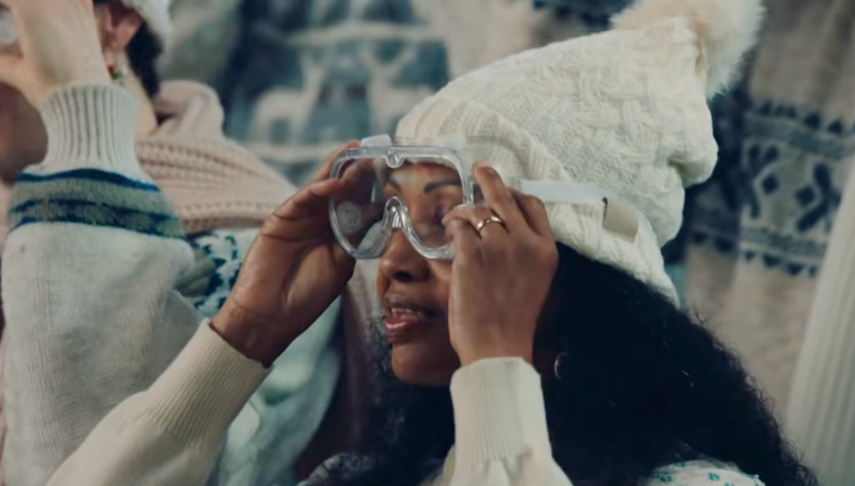 girl putting on goggles 