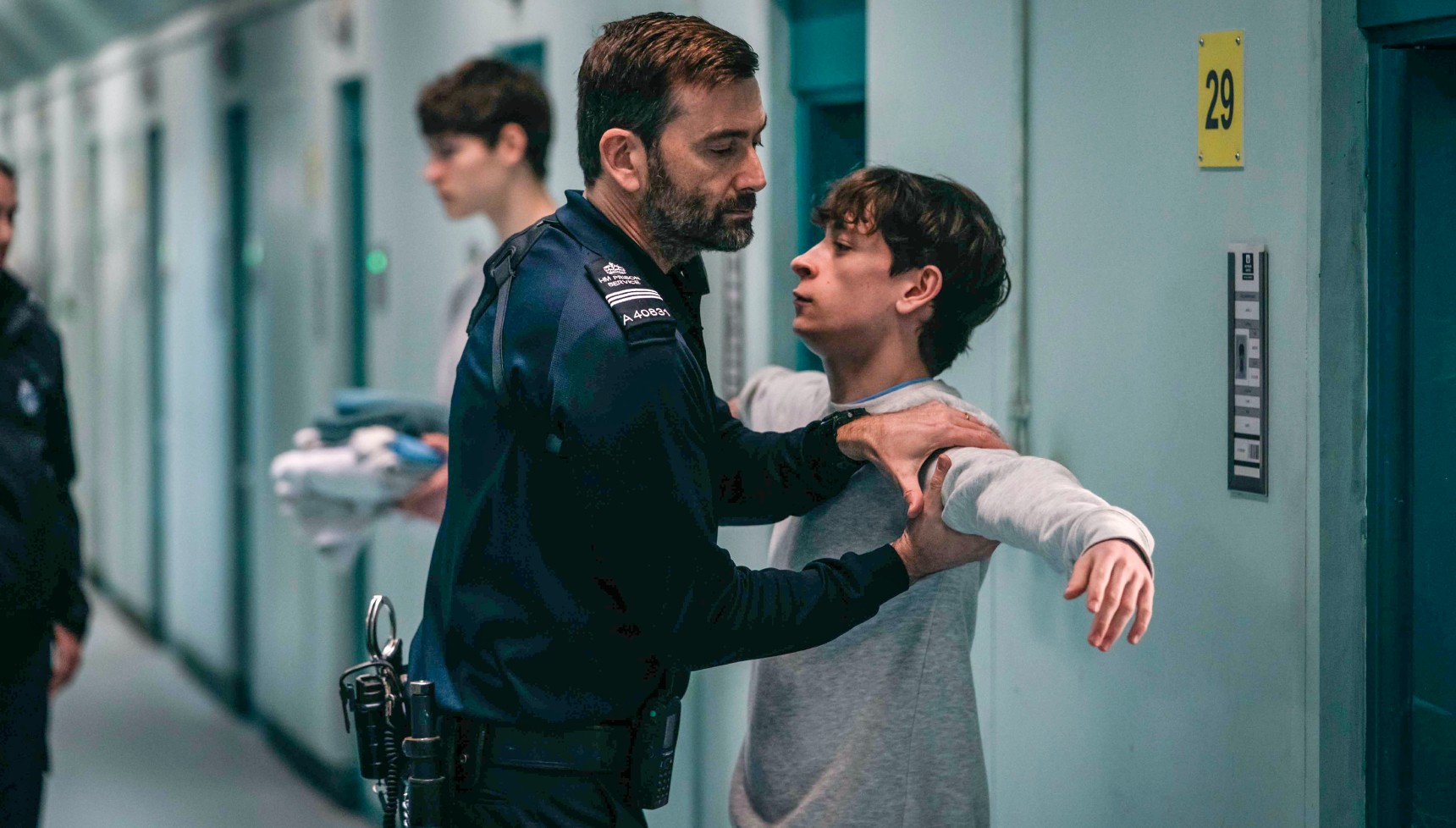 Louis McCartney as James and David Tennant as Bobby Bailey in Time series 3