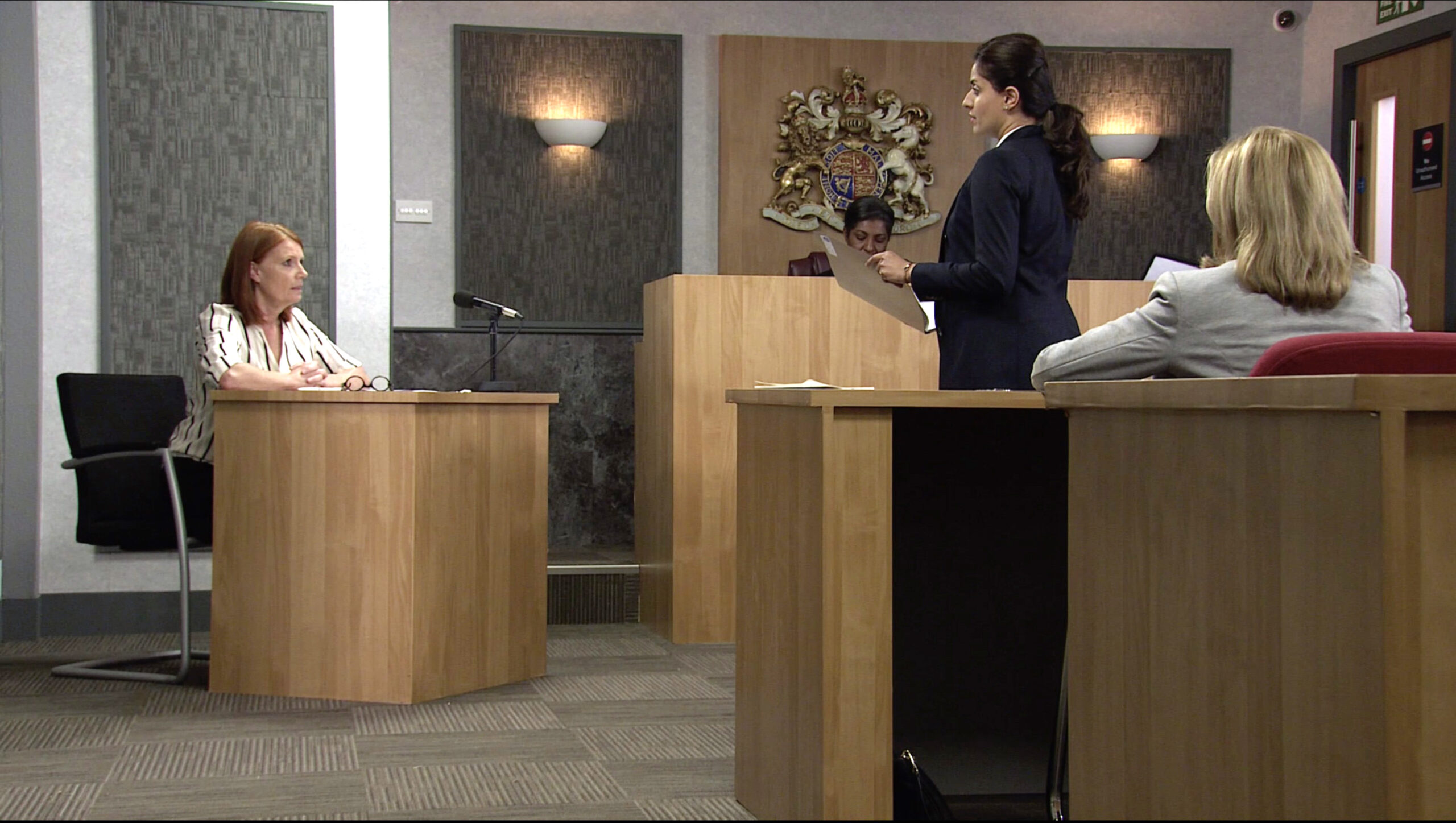 Editorial use only (Credit: ITV/Shutterstock) Coronation Street - Ep 10163 Monday 9th November 2020 - 1st Ep Steve McDonald, as played by Simon Gregson, and Leanne Tilsley, as played by Jane Danson, looks on as Dr Howarth, as played by Caroline Harding, tells the court that in her view, it would be an act of kindness and compassion to switch off Oliver's life support. 'Coronation Street' TV Show, UK - 2020